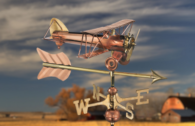 copper biplane weathervane with brass accents